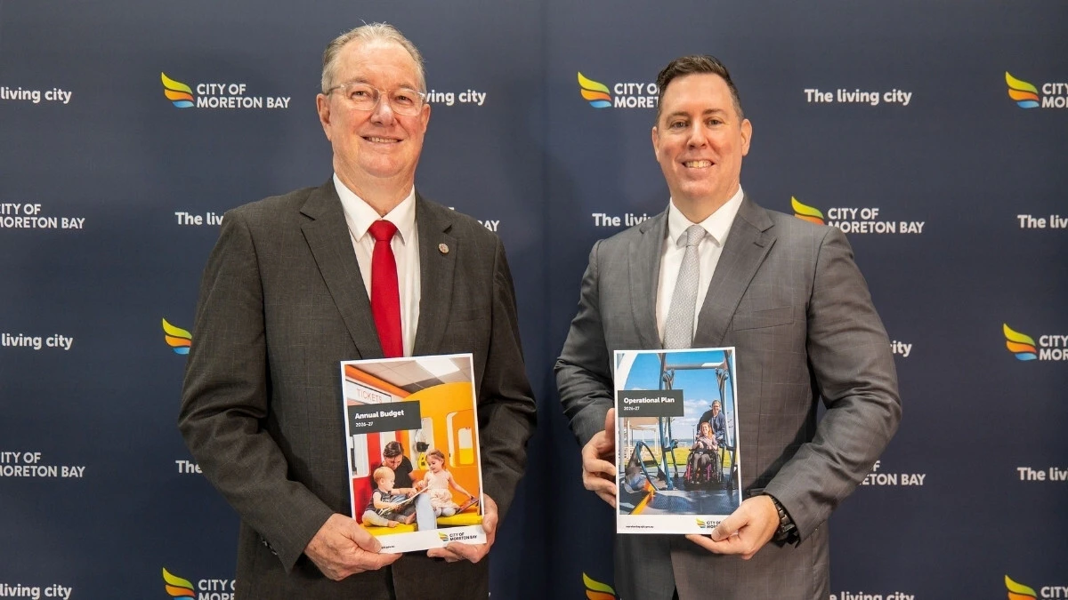 Mayer Peter Flannery holding the Moreton Bay Budget FY26-27