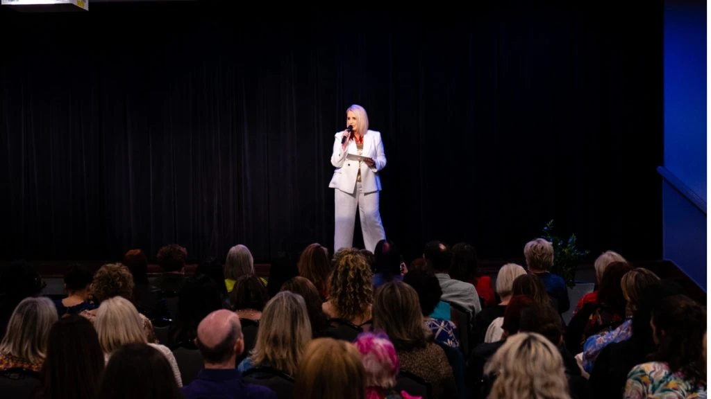 Jacqueline Booker from the Business of Speaking guest speaking at a conference