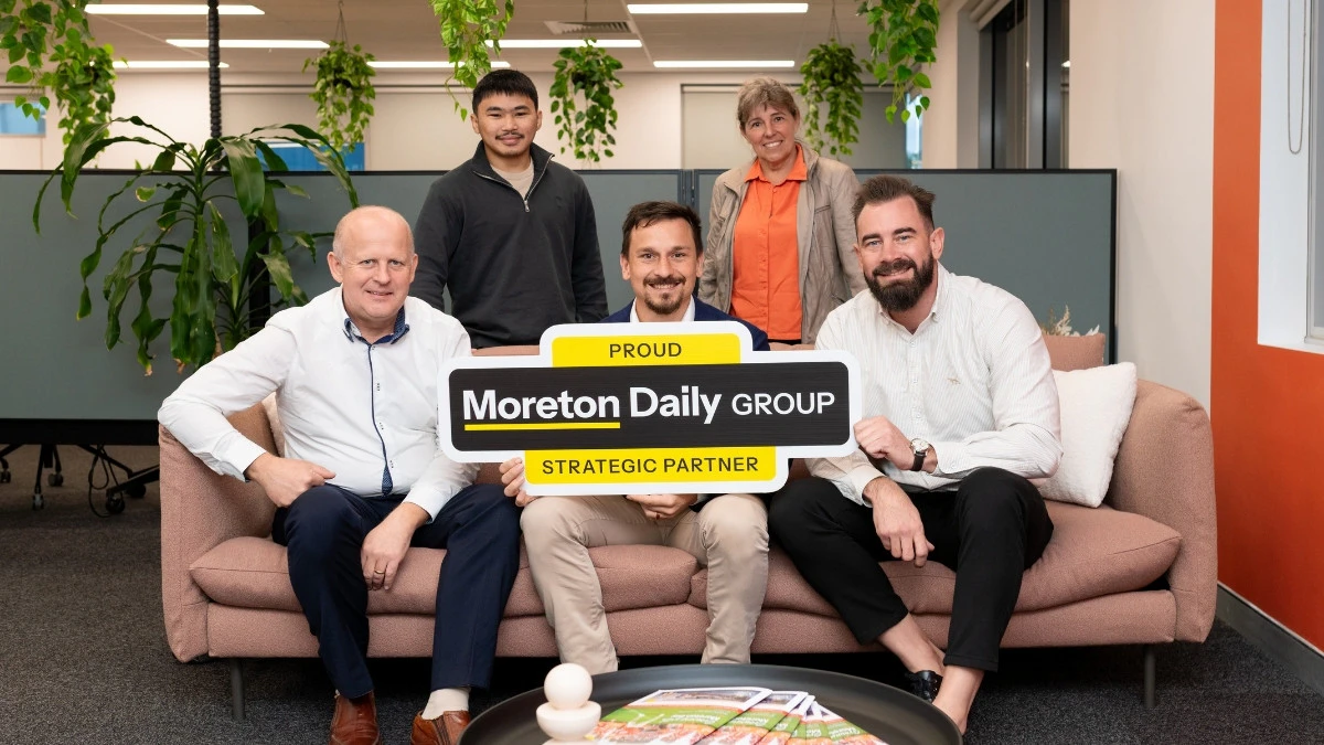 The Evergent team celebrating their Strategic Partnership with Moreton Daily Group