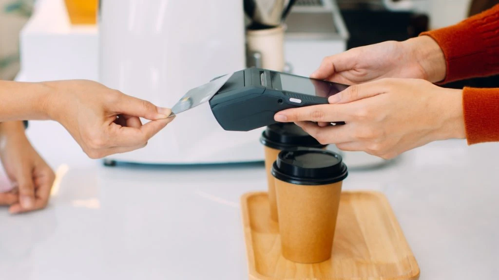 a credit card being used to pay for goods