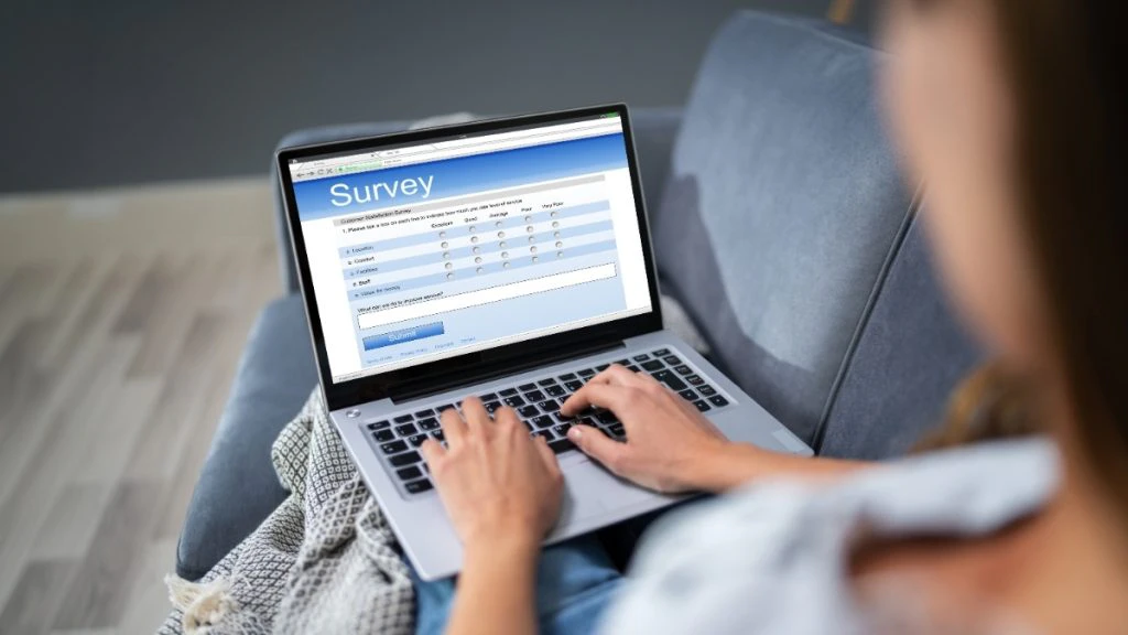 businesswoman filling out a survey