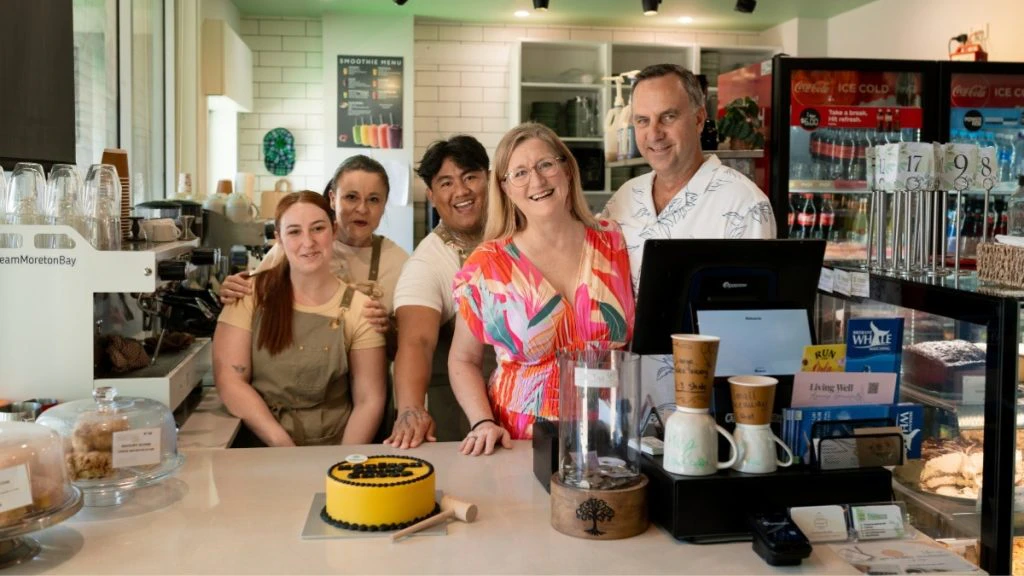 Redcliffe Treehouse with their smash cake to celebrate the Strategic Partnership